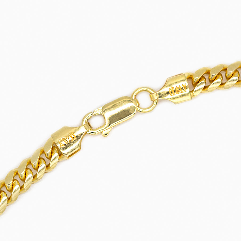 Thick gold cuban link chain close up